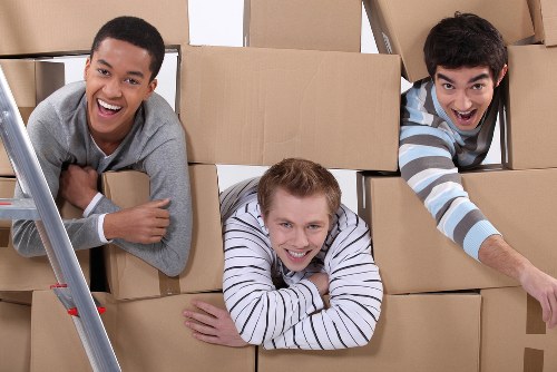 Moving van and boxes for a home move in Kilburn