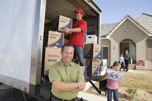 Local moving team working in a Kilburn apartment building