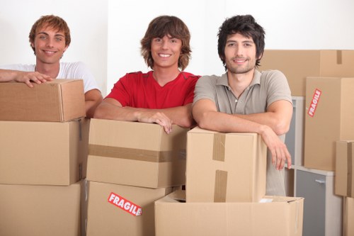 Moving van and boxes representing transparent pricing in Kilburn