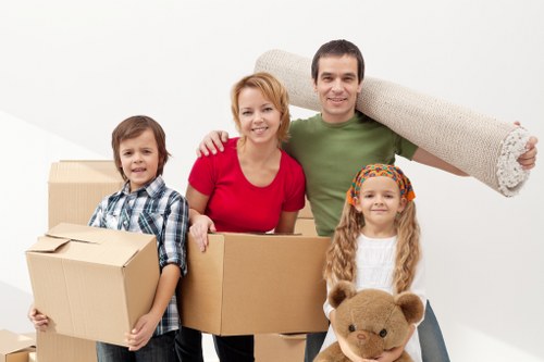 Removal van loading furniture for a Kilburn moving service