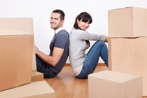 Professional movers handling a flat removal in Kilburn