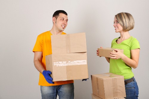 Packed household boxes ready for moving day in Kilburn